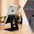 Adjustable Cell Phone Stand, 2020 Aluminum Desktop Stand with Anti-Slip Base and Charging Port, Fits All Smartphones