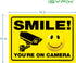 iSYFIX Smile You're on Camera Stickers for Business - 2 Pack 14x10 Inch - Self-Adhesive Vinyl, Laminated for UV Protection, Weather, Fade Resistance, Security Camera Sign for Home, Business, CCTV by iSYFIX