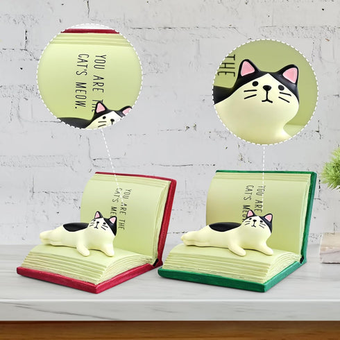 RAQWI Cat Lying on Book Phone Stand, Cute Kitten Cell Phone Holder for Desk, Creative Resin Bookish Decor for Home