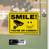 iSYFIX Smile You're on Camera Stickers for Business - 2 Pack 14x10 Inch - UV Protection, Weather Resistance