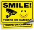 iSYFIX Smile You're on Camera Stickers for Business - 2 Pack 14x10 Inch - UV Protection, Weather Resistance