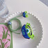 3D Cute Cartoon Charger Protector Case for Apple 20W USB-C Power Adapter and Lightning Cable (Green Hat Mike)