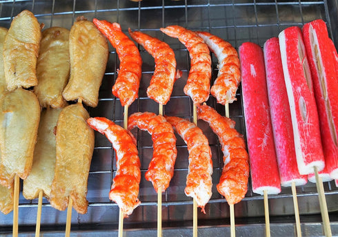 SHDASMIL Grilled Shrimp Skewers with Fried Tofu and Crab Sticks on Rack Backdrop